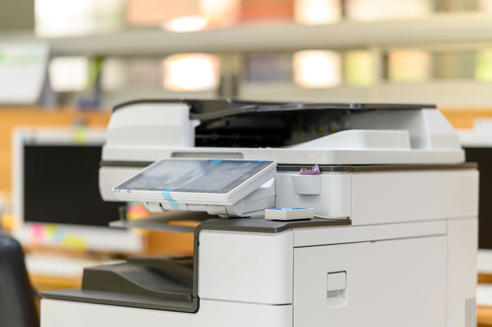 Close up of one of an office's multifunction copiers.